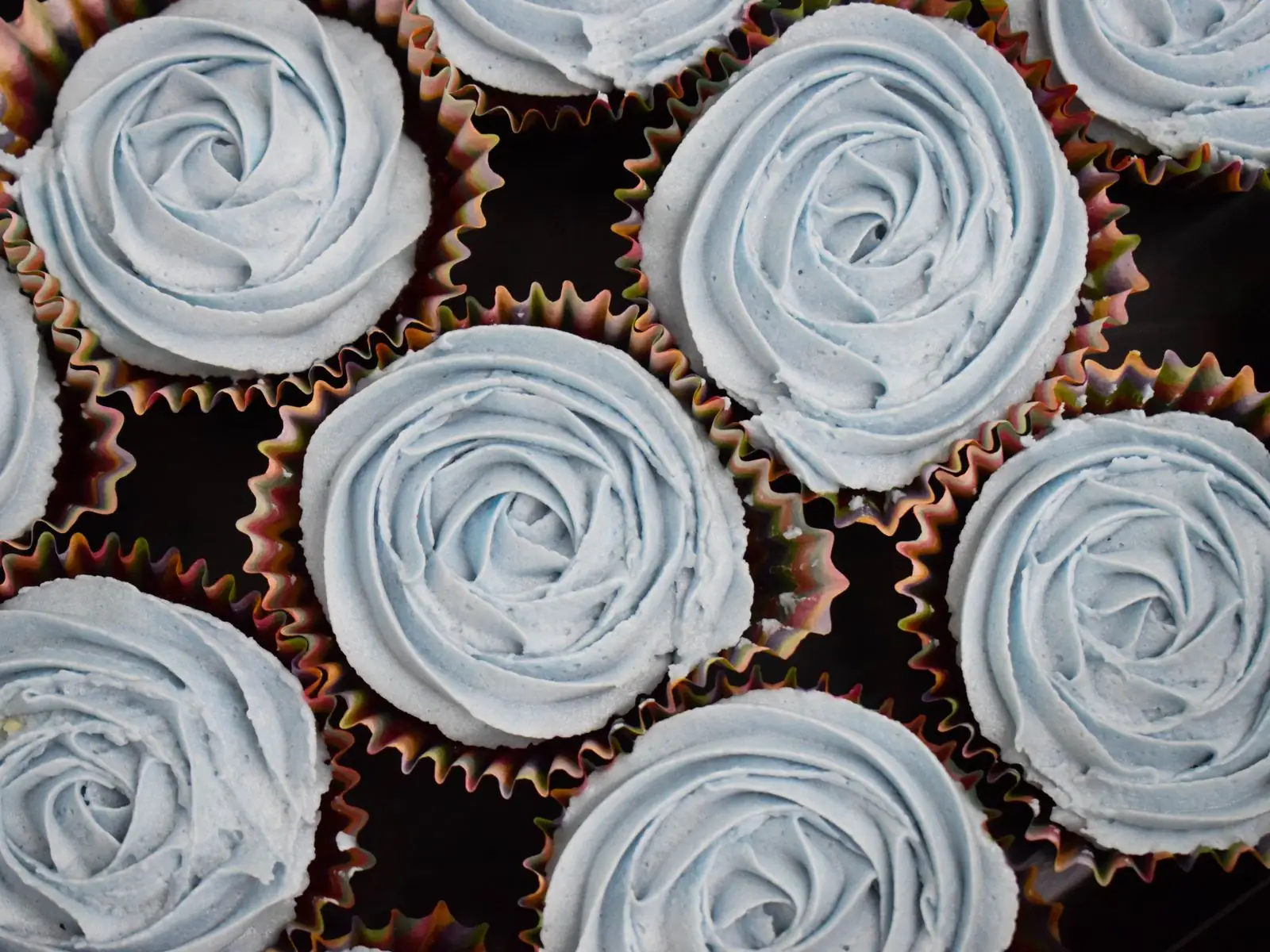 Cupcakes topped with piped buttercream rosettes